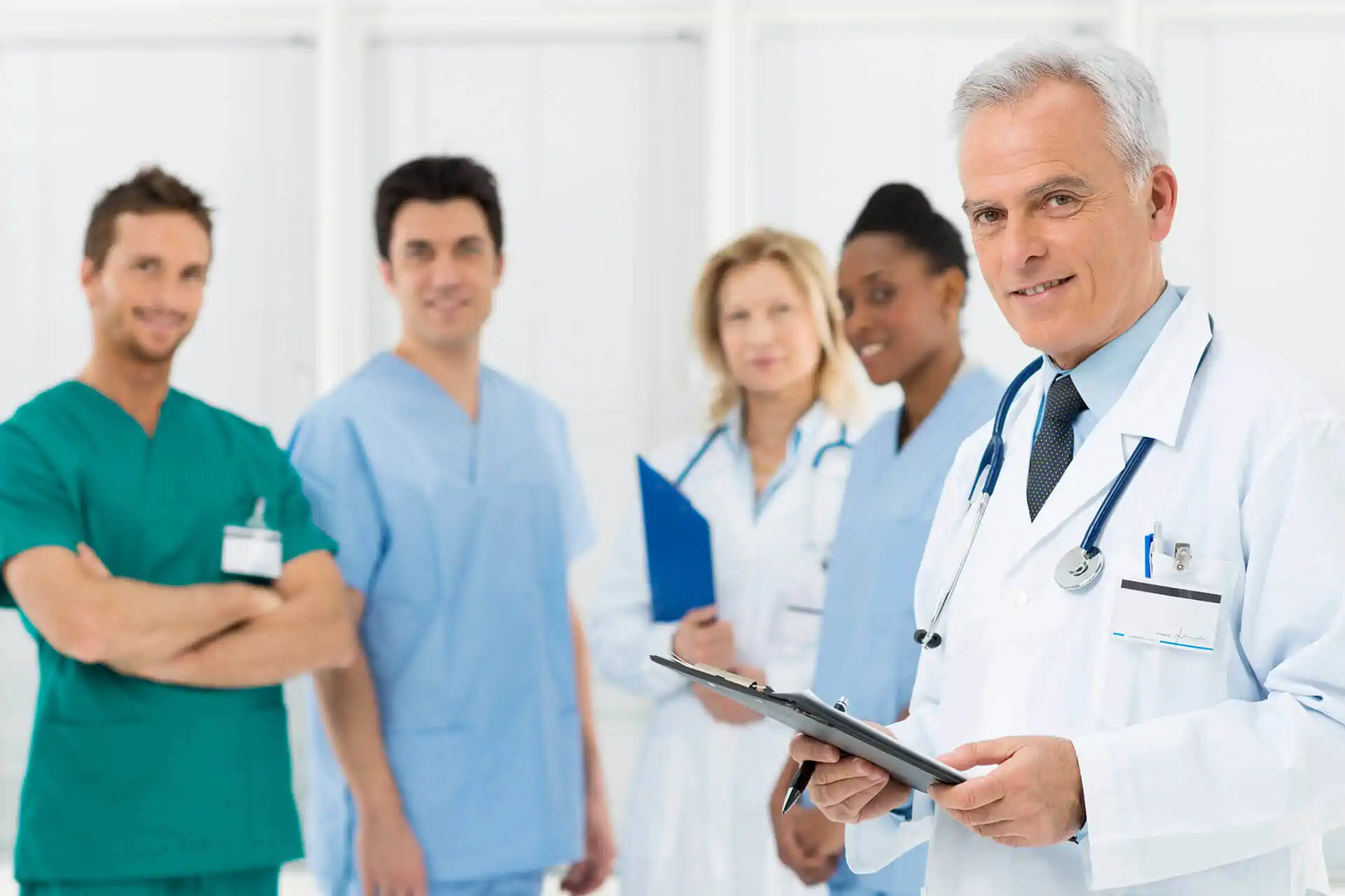 Techs looking at images for signs of osteoporosis